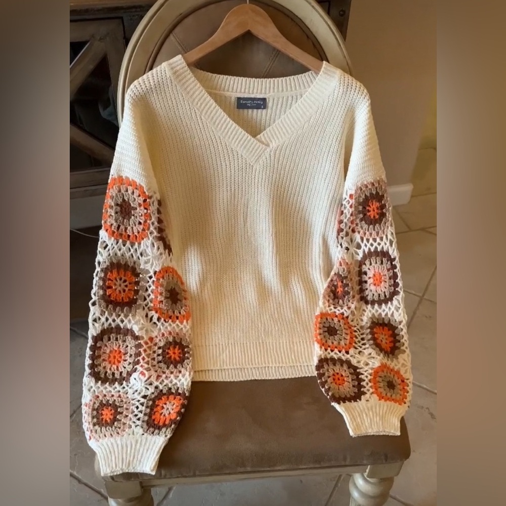 Caslon Cream V-Neck Sweater with Orange and Brown Crochet Sleeve Motifs